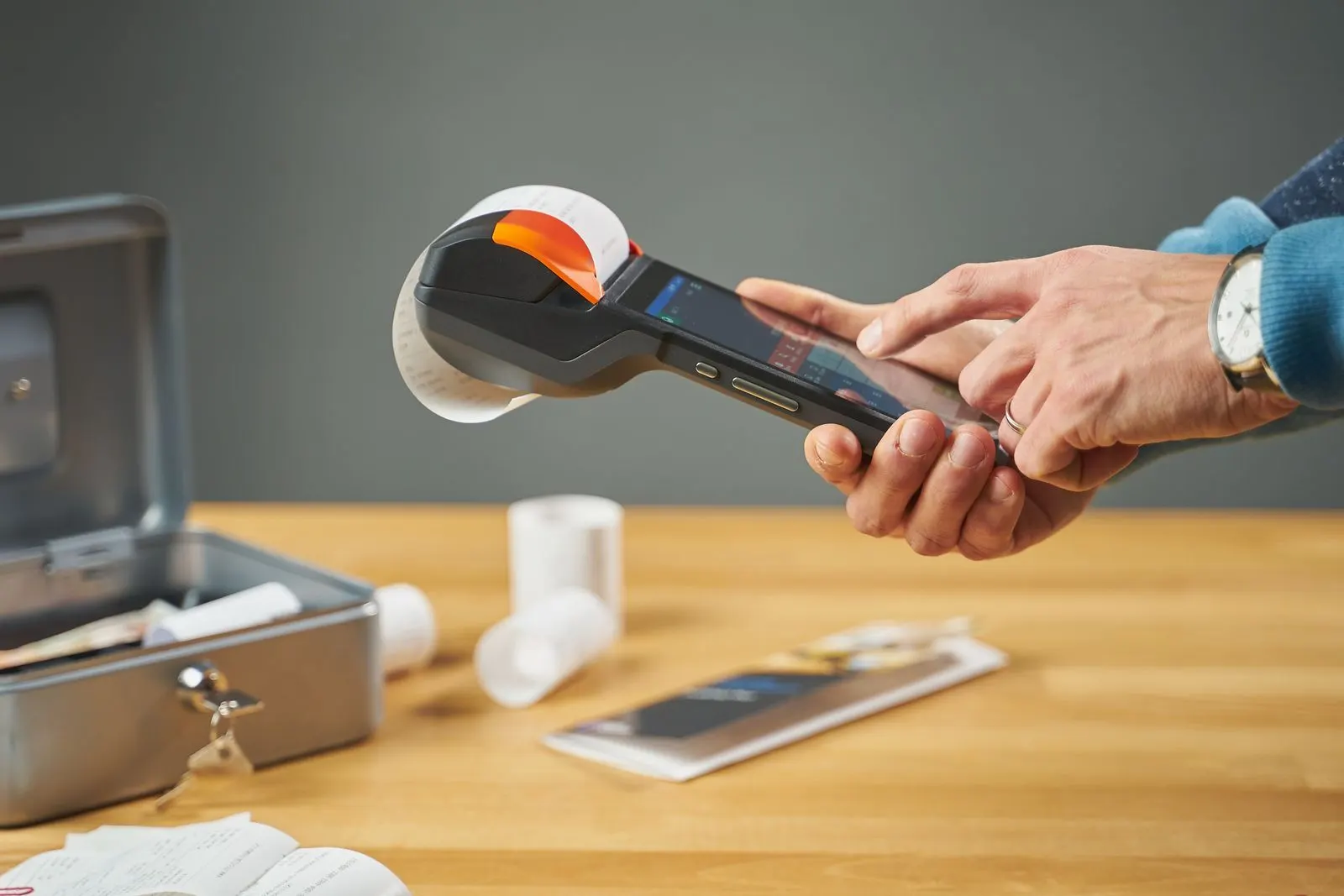 Portable receipt printer printing a receipt